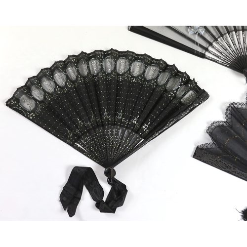 375 - An Edwardian black silk and ornate sequin fan, a similar fan with carved ebony guards and a fine gau... 