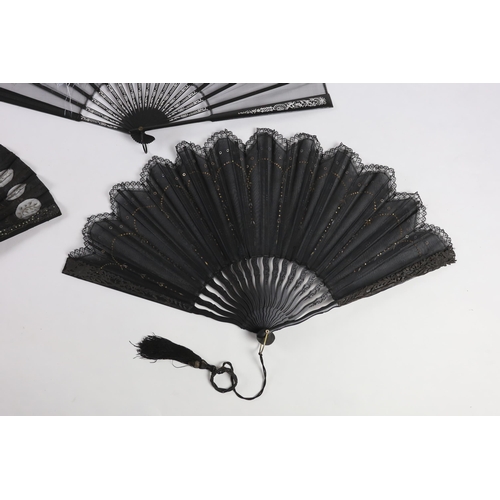 375 - An Edwardian black silk and ornate sequin fan, a similar fan with carved ebony guards and a fine gau... 