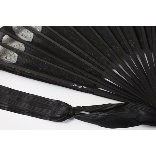 375 - An Edwardian black silk and ornate sequin fan, a similar fan with carved ebony guards and a fine gau... 