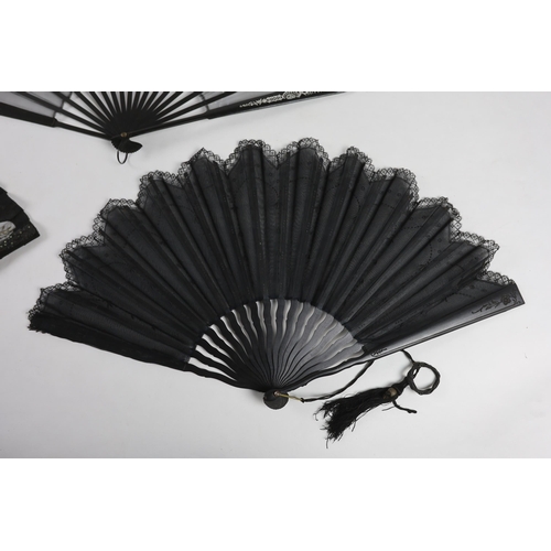 375 - An Edwardian black silk and ornate sequin fan, a similar fan with carved ebony guards and a fine gau... 