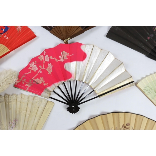 378 - A collection of 19th and 20th century mostly paper fans, ten in reasonable condition useful for stag... 