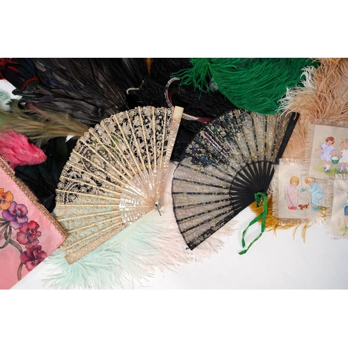 380 - A collection of Edwardian exotic feather hat ornaments, with a collection of coloured ostrich feathe... 