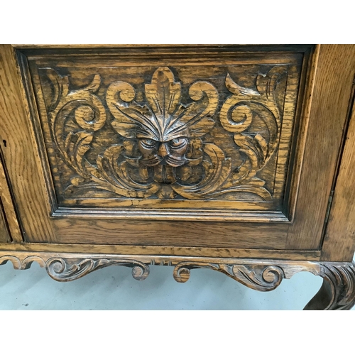 4 - An early 20th century Flemish carved oak bow front dresser, width 138cm, depth 50cm, height  185cm... 