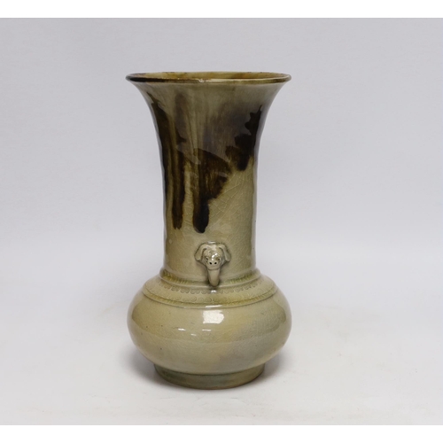 407 - A Japanese celadon and brown glazed vase with mythical beast handles, 27cm