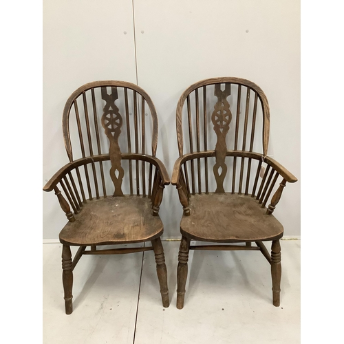 41 - A pair of ash and elm Windsor wheel back armchairs, width 58cm, depth 48cm, height 112cm