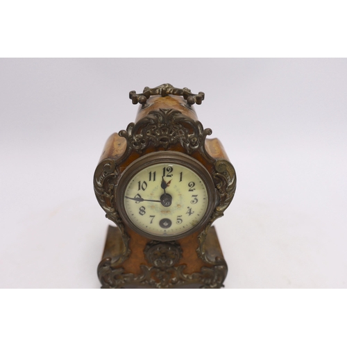 411 - A small brass mounted mantel timepiece, German movement, with key, 18cm