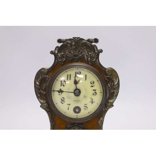 411 - A small brass mounted mantel timepiece, German movement, with key, 18cm