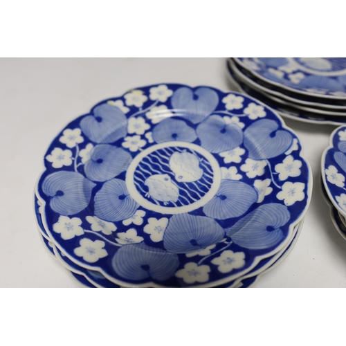 427 - Twelve Japanese blue and white fish plates, 21cm diameter