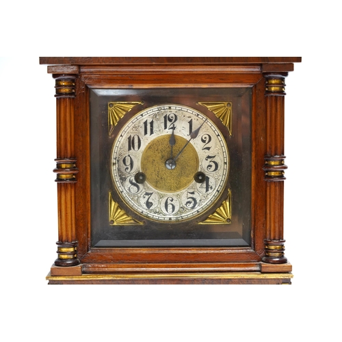 444 - A Black Forest mantel clock with an HAC, Wurttemberg movement, striking on a coiled gong, 35cm high ... 