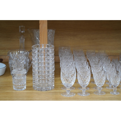 446 - A suite of Waterford drinking glasses in various sizes, including wine glasses, liqueur glasses, cha... 