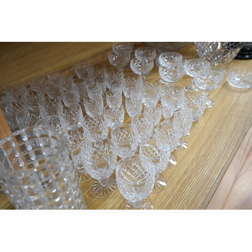 446 - A suite of Waterford drinking glasses in various sizes, including wine glasses, liqueur glasses, cha... 