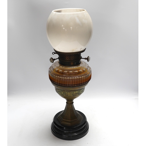 447 - A Victorian glass and brass oil lamp by Jones & Willis, 53cm high