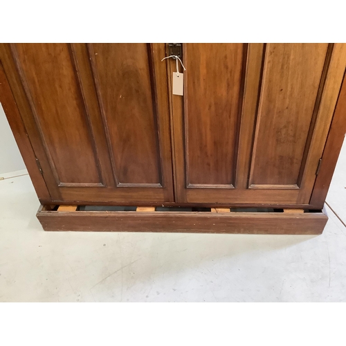 45 - An Edwardian mahogany two door side cabinet, (loose plinth), width 124cm, depth 29cm, height 126cm... 