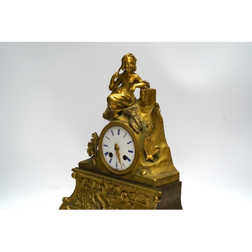 456 - A mid 19th century French ormolu figural mounted clock with silk suspension, with key, 36cm