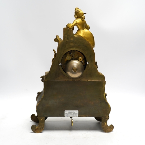 456 - A mid 19th century French ormolu figural mounted clock with silk suspension, with key, 36cm