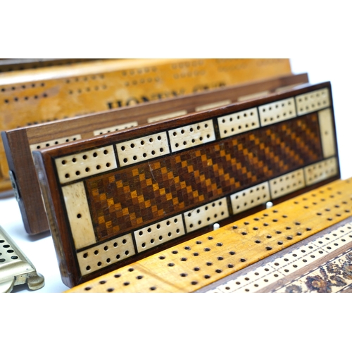 458 - Nine cribbage boards including a horn example, 'Wills Tobacco' advertising and bone and marquetry ex... 