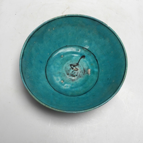 463 - A Kashan turquoise glazed fritware bowl, Persia, 13th/14th century, 25cm diameter