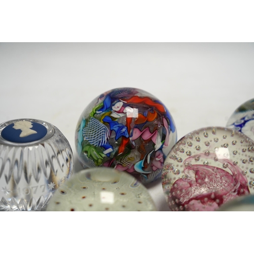 464 - Eleven mixed Scottish and other glass paperweights including Caithness, largest 8.5cm in diameter... 