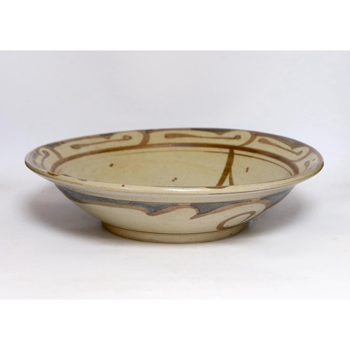 482 - Svend Bayer, (b.1946), a studio pottery stoneware bowl with a stylised bird decoration, 44cm