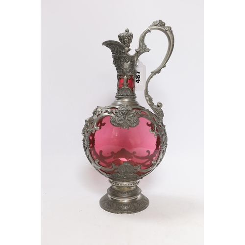 487 - A Bohemian style pewter mounted cranberry glass ewer and twelve glasses, possibly Romanian, 33cm hig... 