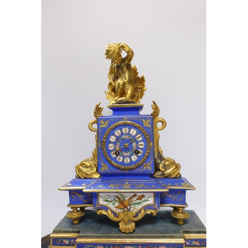 488 - A 19th century French porcelain and gilt mantel clock under glass dome, striking on a bell, the face... 