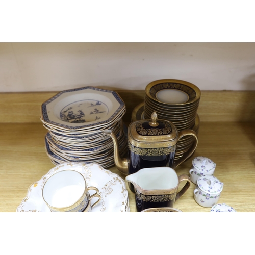 493 - A Raynaud and Co. Limoges gilt and navy ten cup coffee service, a Woodsware part dinner service and ... 