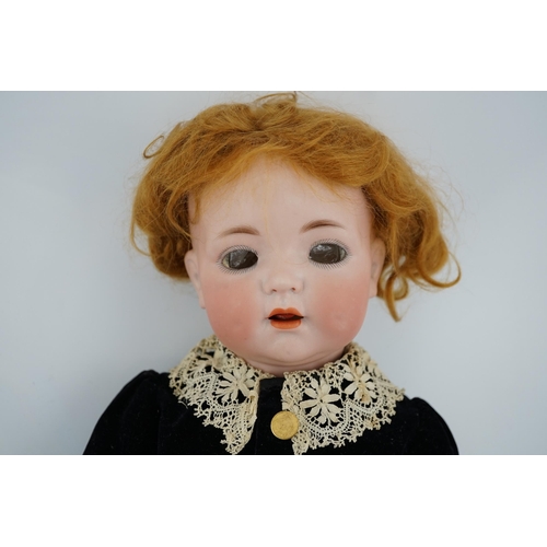 497 - A K&R Kammer & Reinhart /S & H bisque 121 head doll on toddler body, with vintage shoes and socks, 4... 