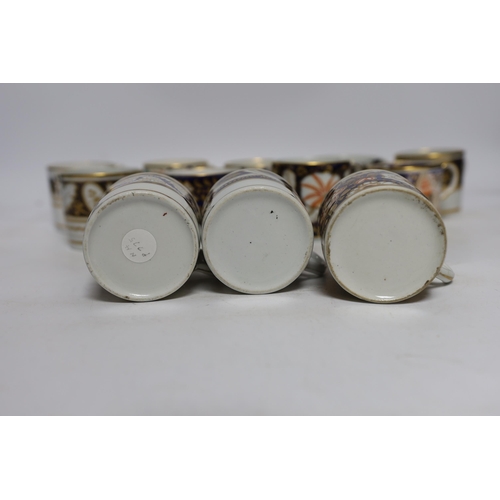 502 - Twelve 1800-1820 English porcelain coffee cans, including Imari pattern examples