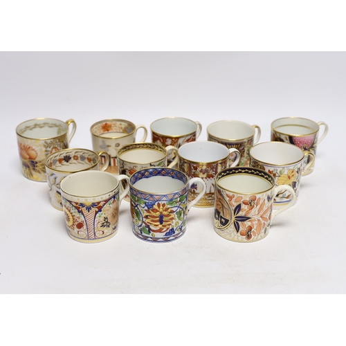 504 - Twelve 1800-1820 English porcelain coffee cans, including Imari pattern examples