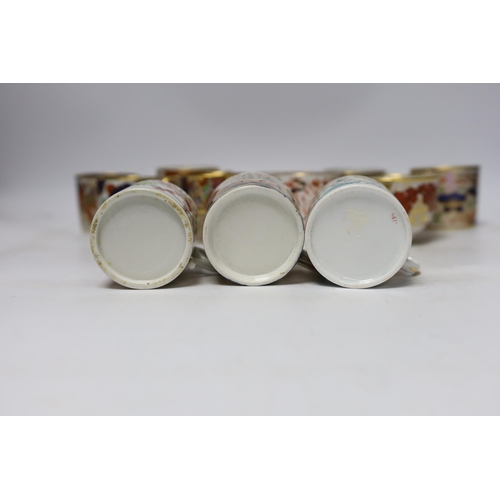 506 - Twelve 1800-1820 English porcelain coffee cans and tea cups, including Imari pattern examples