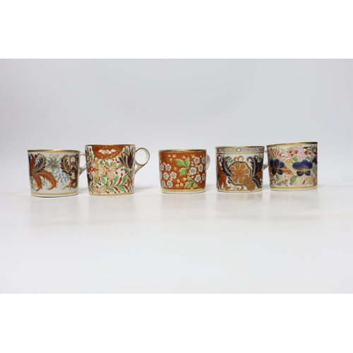 506 - Twelve 1800-1820 English porcelain coffee cans and tea cups, including Imari pattern examples