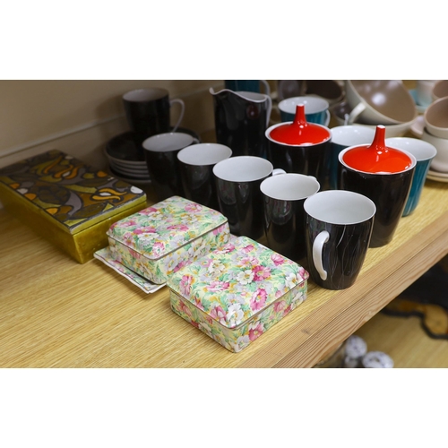 508 - A group of 1960's Poole pottery coffee wares, Chintz boxes, etc.