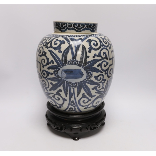 511 - A 19th century Chinese blue and white jar and cover, with stand, 29cm total (including stand)