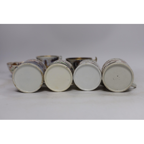 512 - Eleven 1800-1820 English porcelain coffee cans and tea cups, including Imari pattern examples, one w... 