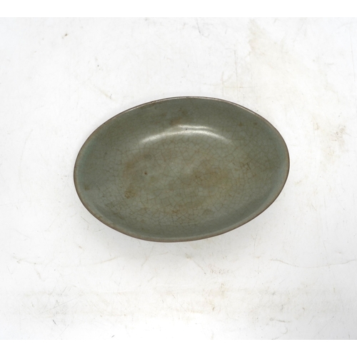 515 - A Chinese oval celadon crackle glaze dish, 15.5cm wide