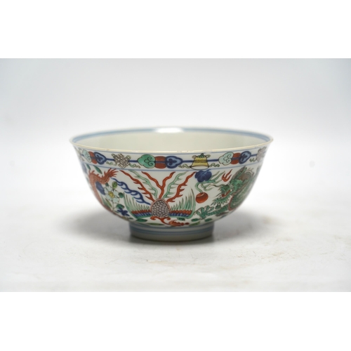 516 - A Chinese wucai dragon and phoenix bowl, early 20th century, diameter 15cm