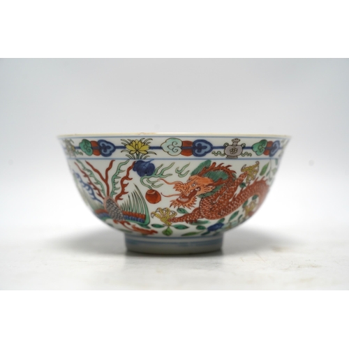 516 - A Chinese wucai dragon and phoenix bowl, early 20th century, diameter 15cm