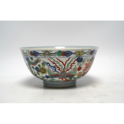 516 - A Chinese wucai dragon and phoenix bowl, early 20th century, diameter 15cm