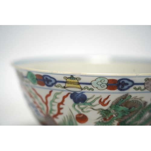 516 - A Chinese wucai dragon and phoenix bowl, early 20th century, diameter 15cm