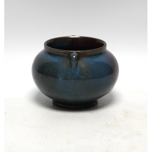 521 - A Chinese Ming-style crimson glazed pot, 8cm high