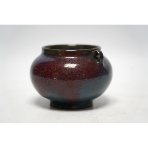 521 - A Chinese Ming-style crimson glazed pot, 8cm high