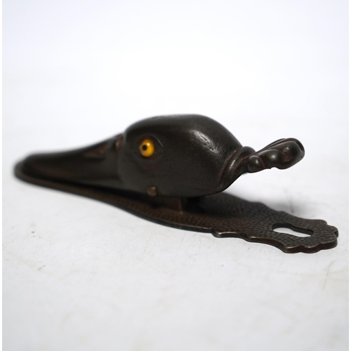 542 - A base metal, glass eyed ducks head letter clip, with stamp on base: 5180, 13cm long