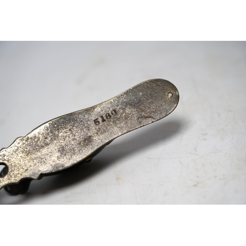 542 - A base metal, glass eyed ducks head letter clip, with stamp on base: 5180, 13cm long