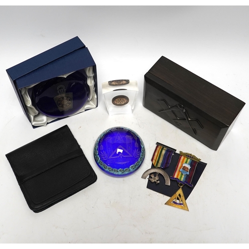 551 - Lewes related Masonic items; to include a set of medals, a box, a box and two paperweights