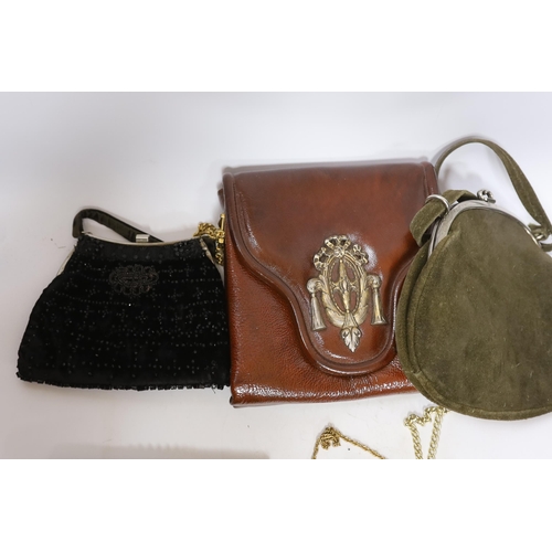 554 - A Tseklenis ladies handbag, a green suede bag, five various evening bags and two purses