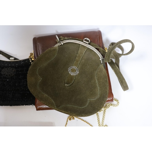 554 - A Tseklenis ladies handbag, a green suede bag, five various evening bags and two purses