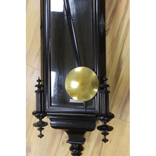 559 - A late 19th century ebonised Viennese regulator, approx. 122cm high