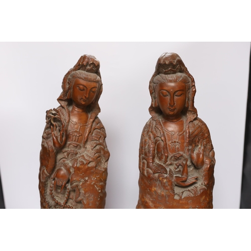 563 - Two large Chinese rootwood figures of Guanyin, 57cm high