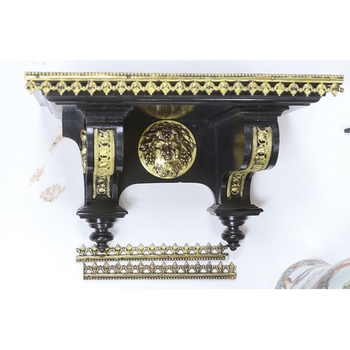 565 - An ebonised German bracket clock with brass decoration, with a Lenzkirch movement striking on a coil... 