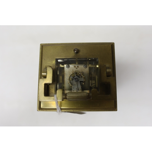 566 - A cased early 20th century brass repeating carriage clock with alarm, 15.5cm